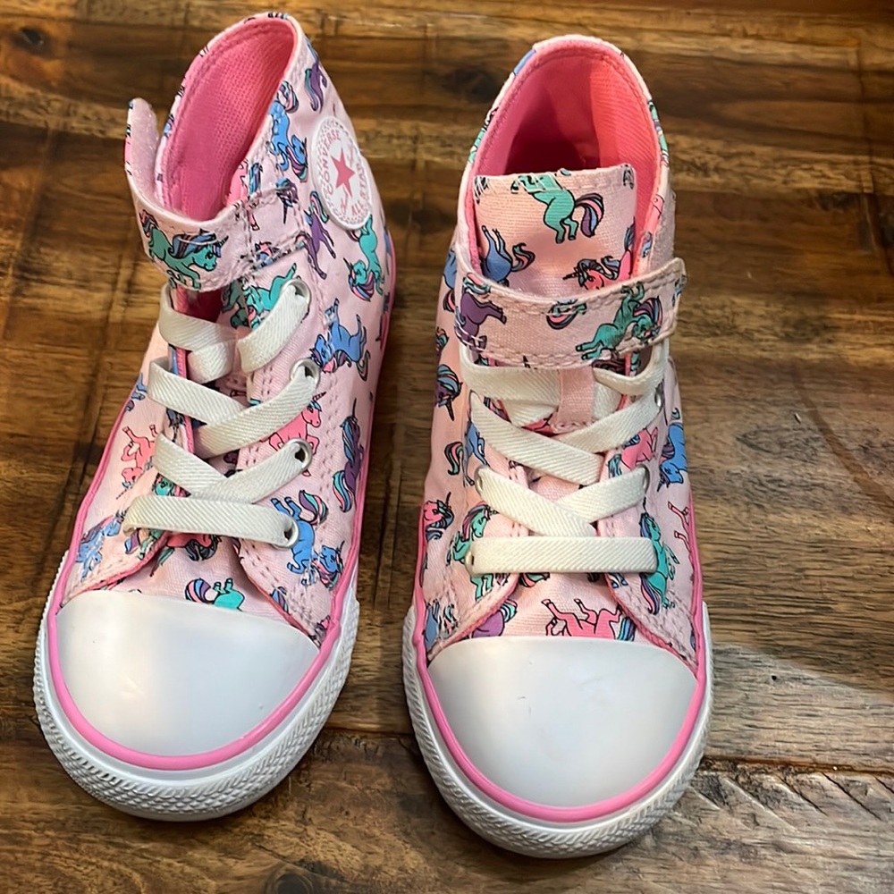 Converse All Star high top unicorn shoes.